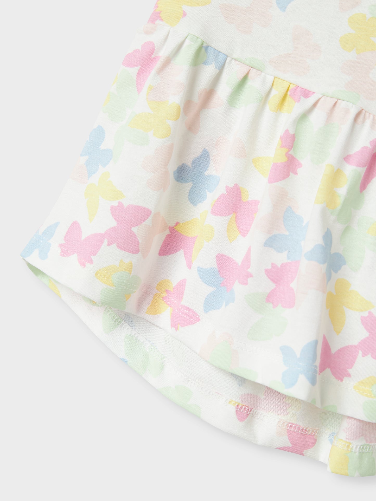 NMFVIGGA CAPSL DRESS F1 NOOS