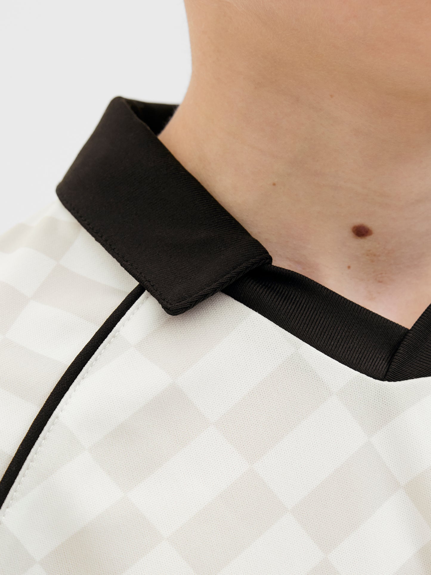 JCOLIDO AOP MESH OPEN COLLAR POLO JNR