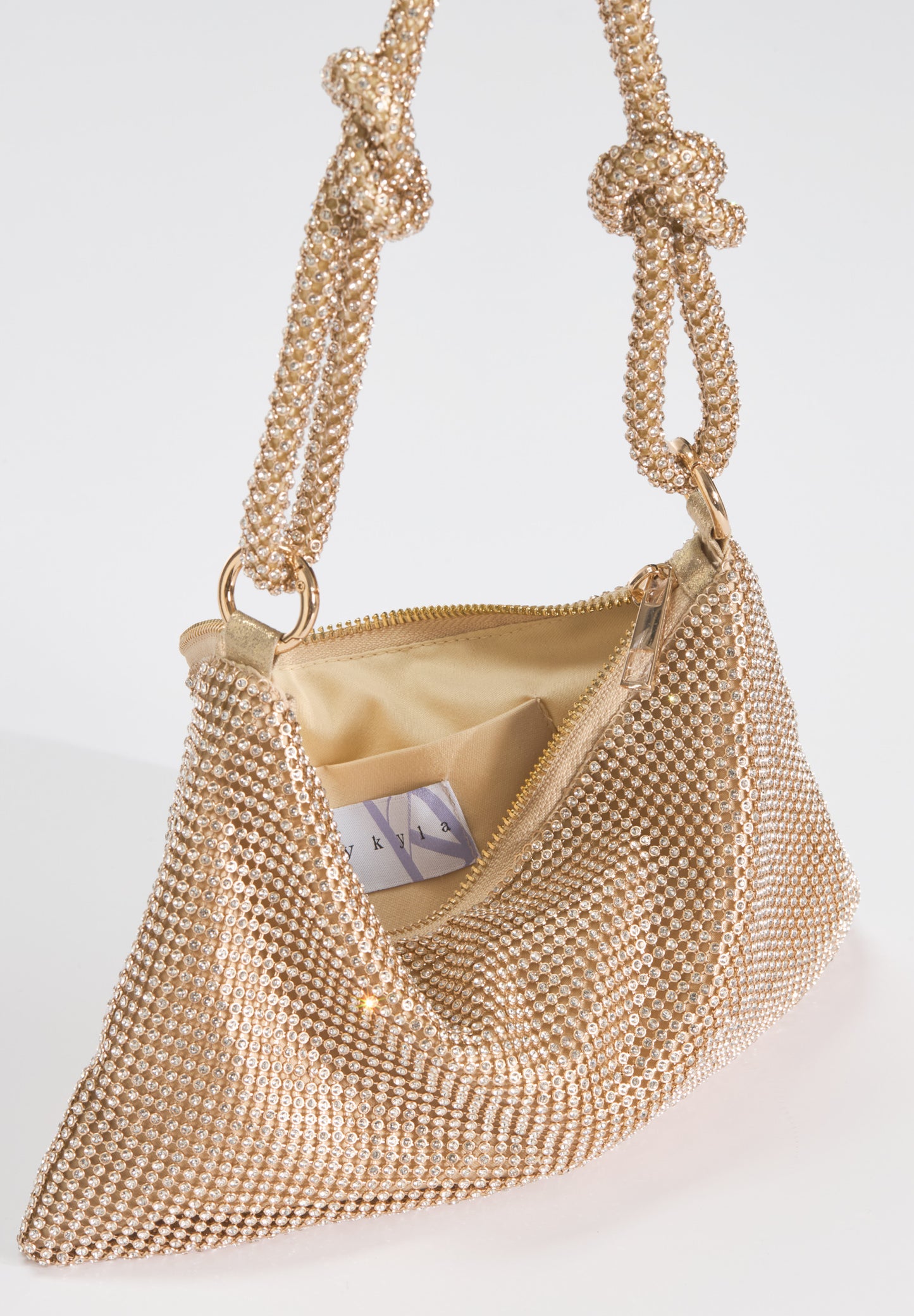 Elegante Handtasche aus glänzendem Strassgewebe