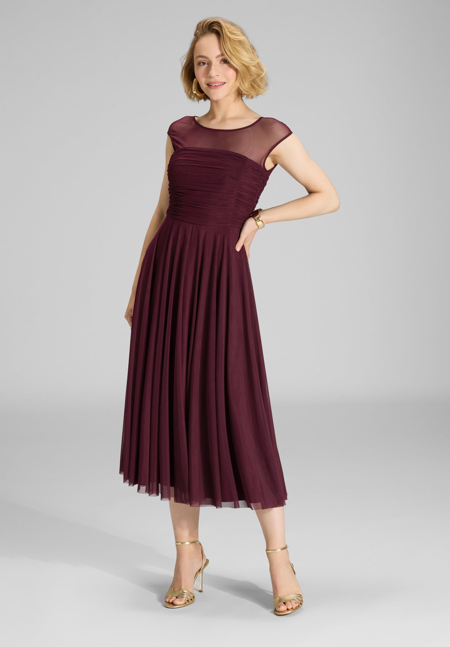 Cocktailkleid aus Mesh mit geraffter Korsage