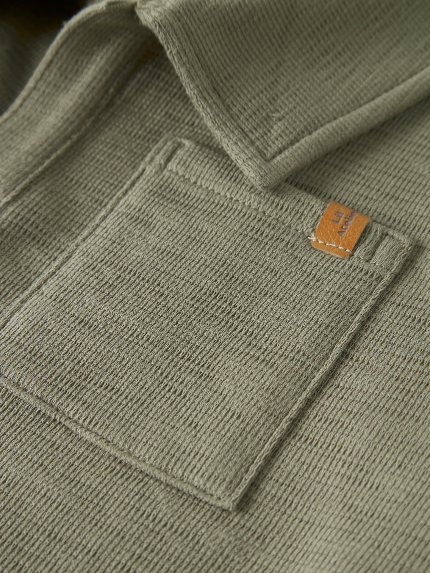 NMMFALK SS LOOSE POLO TOP LIL