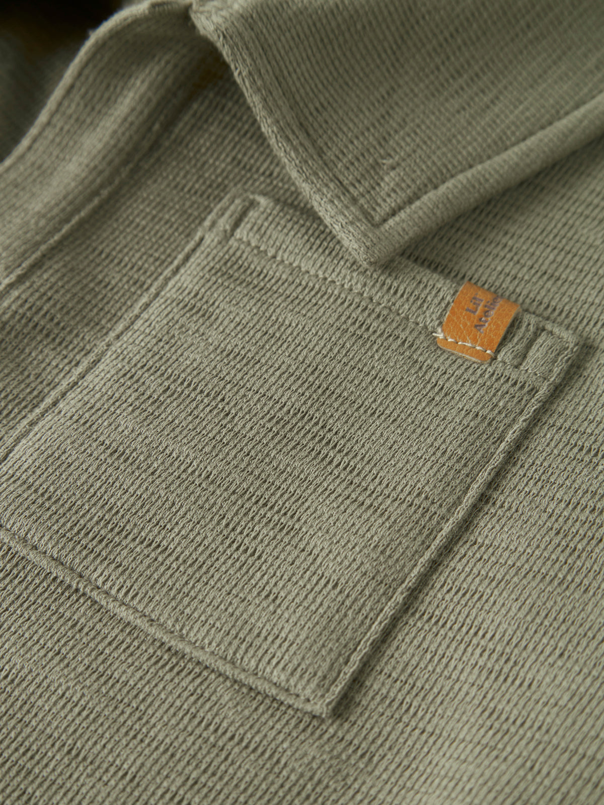 NMMFALK SS LOOSE POLO TOP LIL